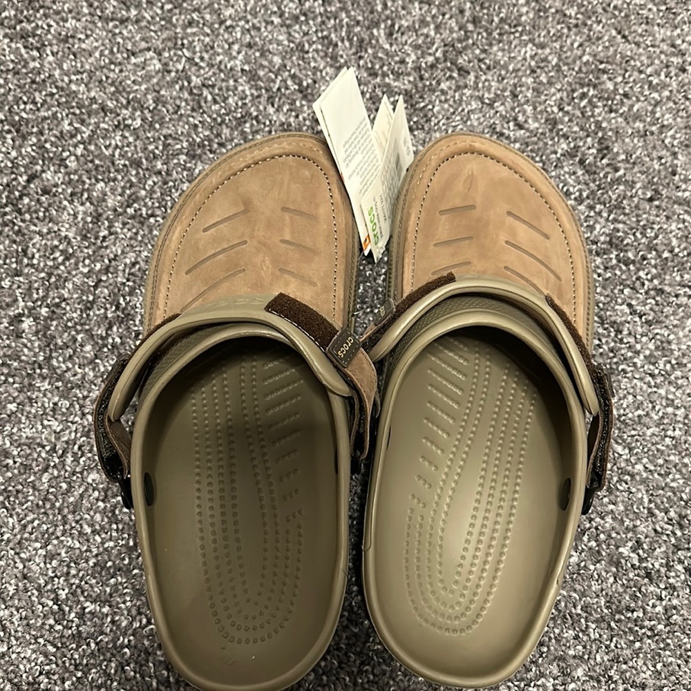 Men’s size 10 women’s 12 tan “dress” crocs.